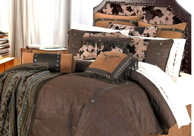 "Luxurious Caldwell 5-Piece Western Bedding Set featuring cowhide and faux leather accents in a rustic bedroom setting."
