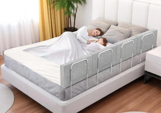 OCBAiLi adjustable bed rails and safety bumpers set up on a queen-size bed, providing protective cushioning for adults, toddlers, and seniors.